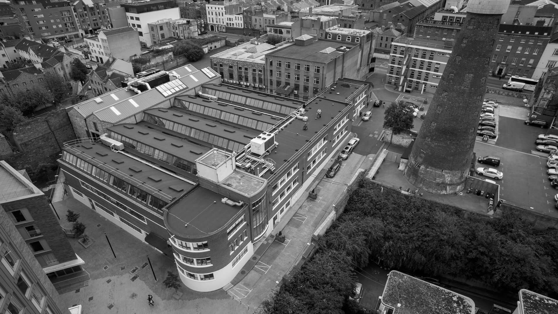 An aerial, black-and-white view of the Digital Hub Campus showing the Digital Depot building